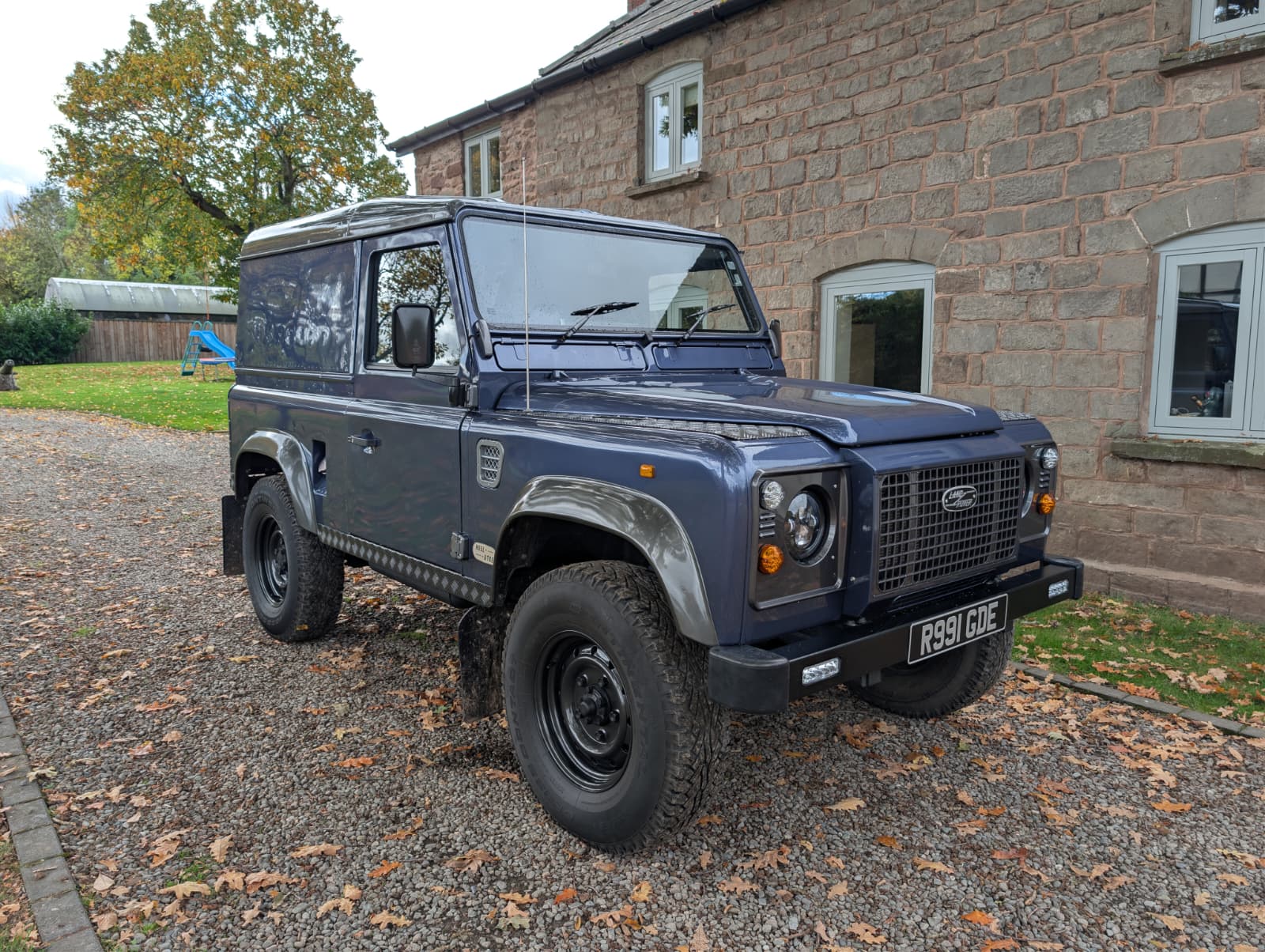 blue land rover defender